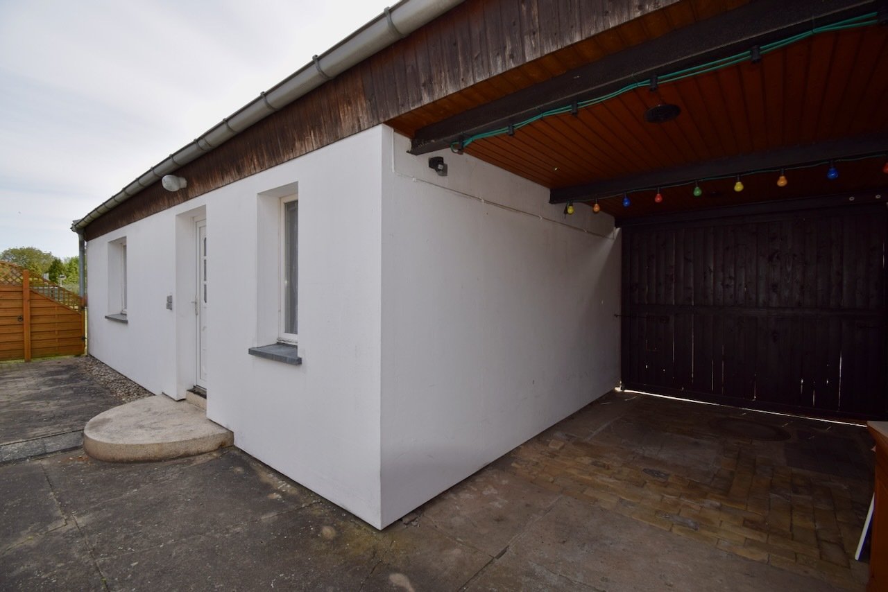 Carport und Einlieger